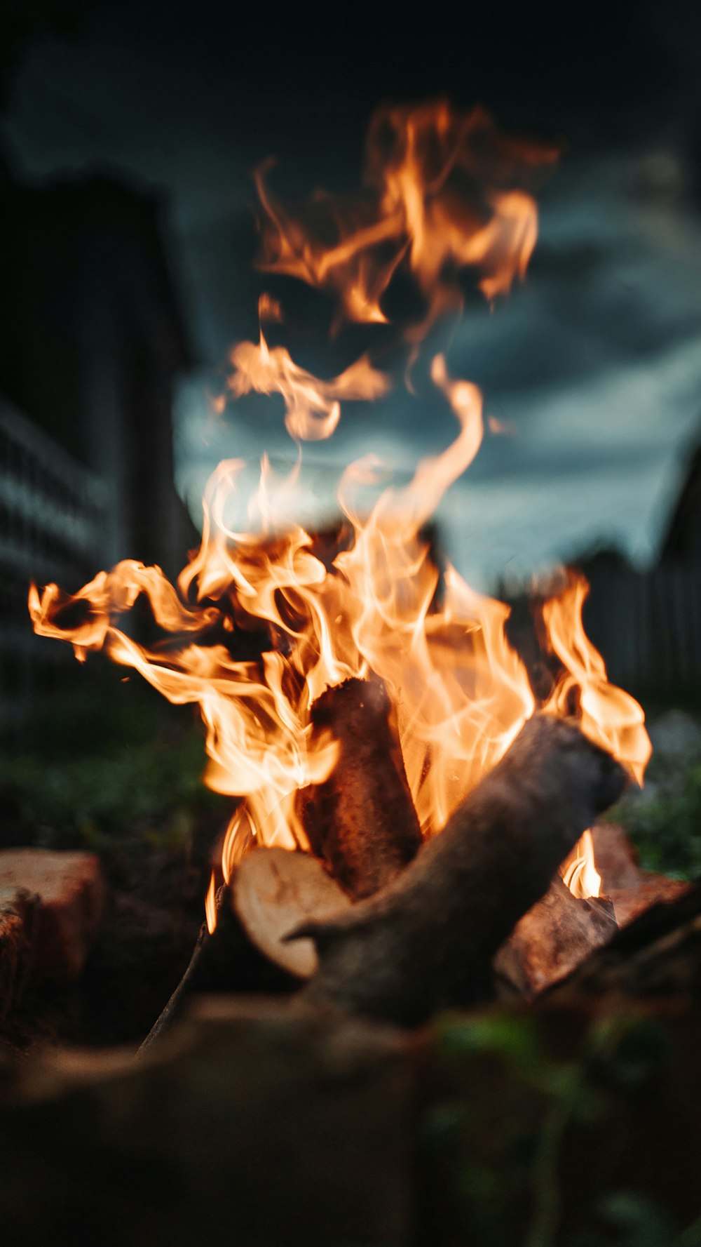 a close up of a fire burning in a field