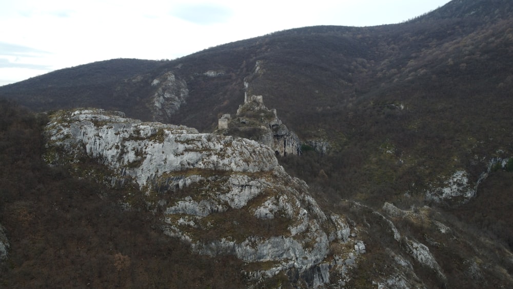 a mountain with a castle on top of it