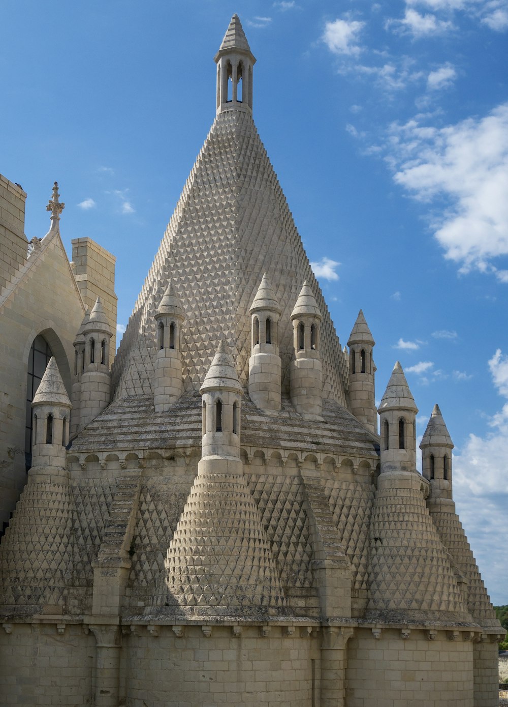 a large sand castle with a clock tower