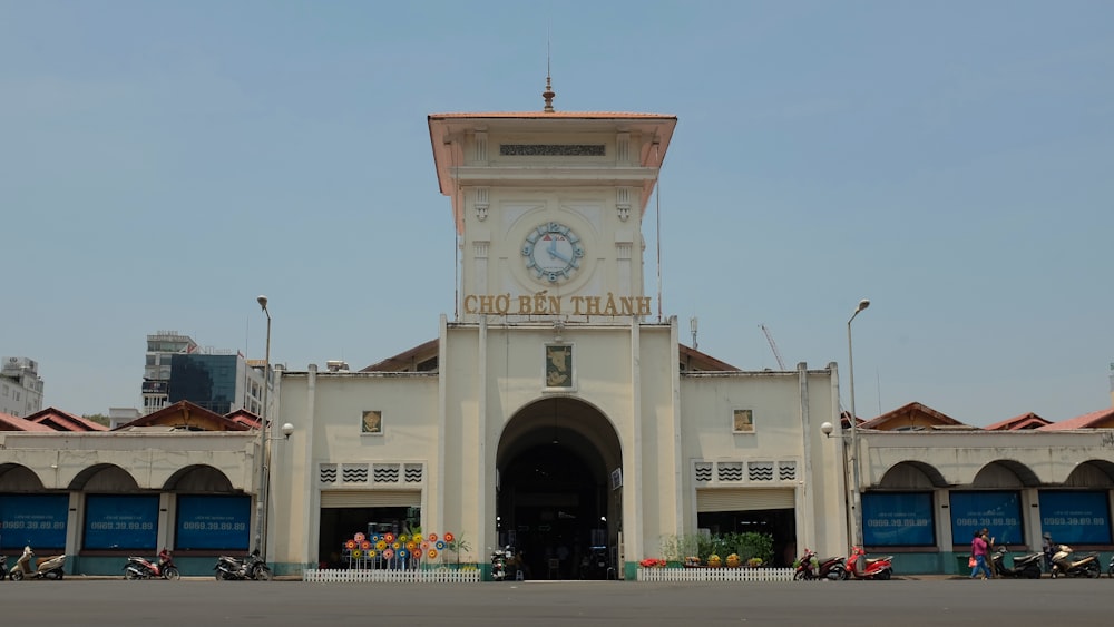 a large building with a clock on the front of it