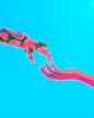 robot and human hands reaching toward each other