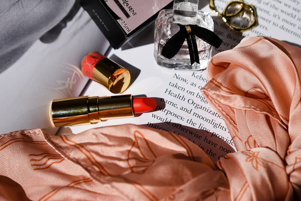 a close up of a lipstick on a table