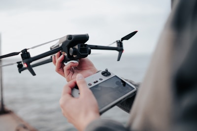Pilot and drone operator preparing equipment for a public safety flight over rural Montana.