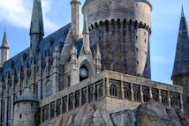 a castle with a clock on the front of it