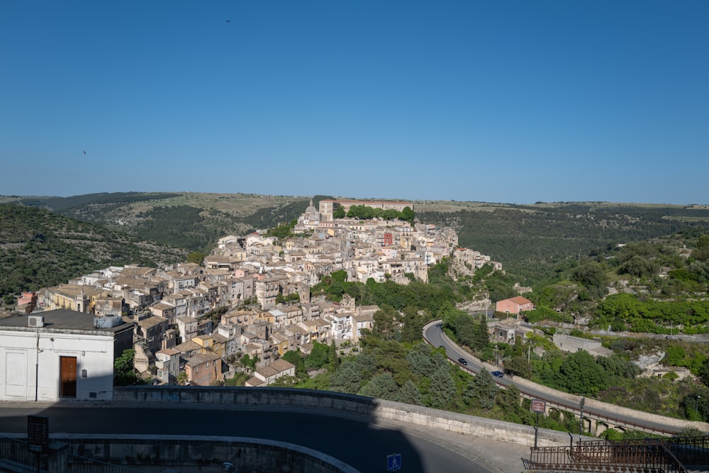 a view of a village from a hill