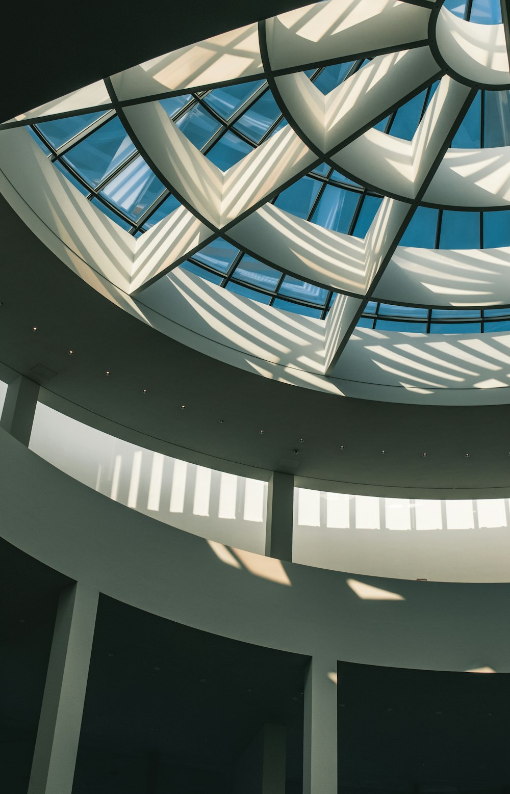 a circular building with a skylight in the middle of it
