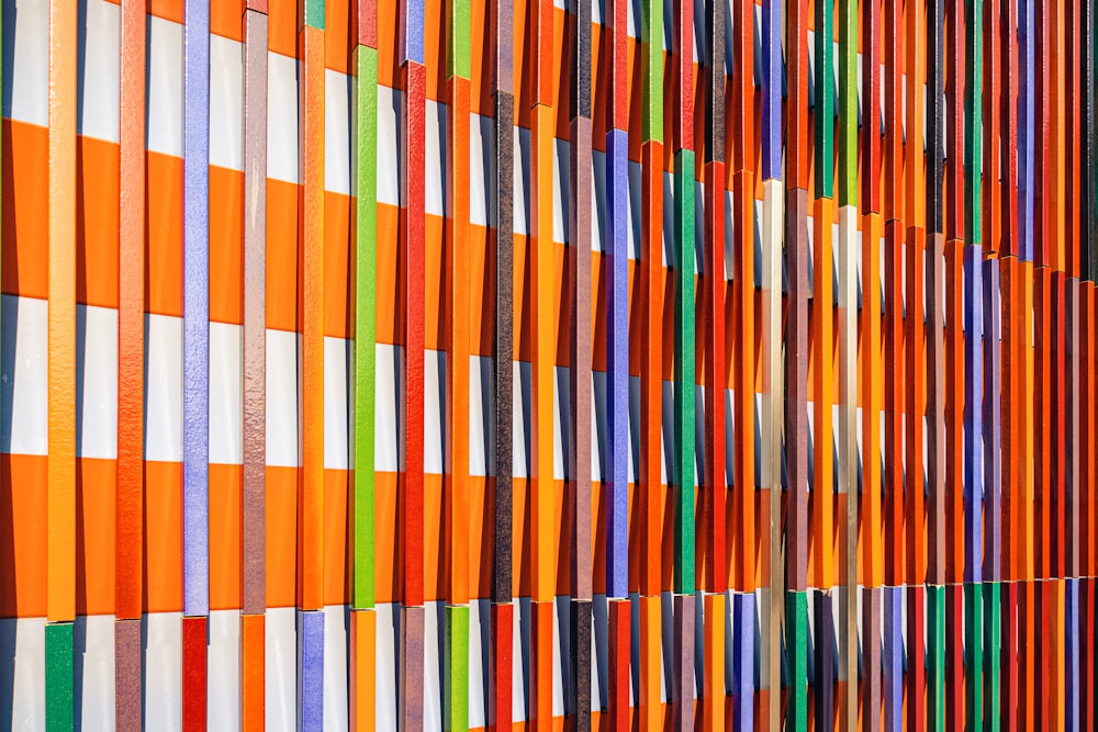 a wall made up of many different colored strips