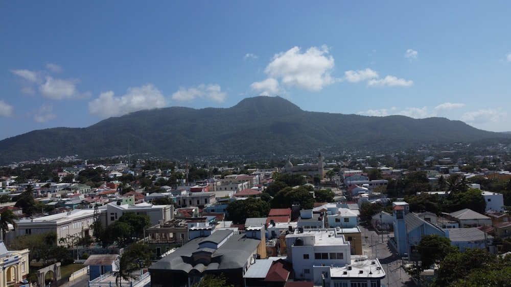 a city with a mountain in the background