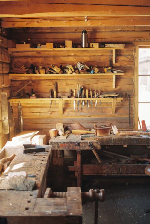A workbench laid out with hand tools