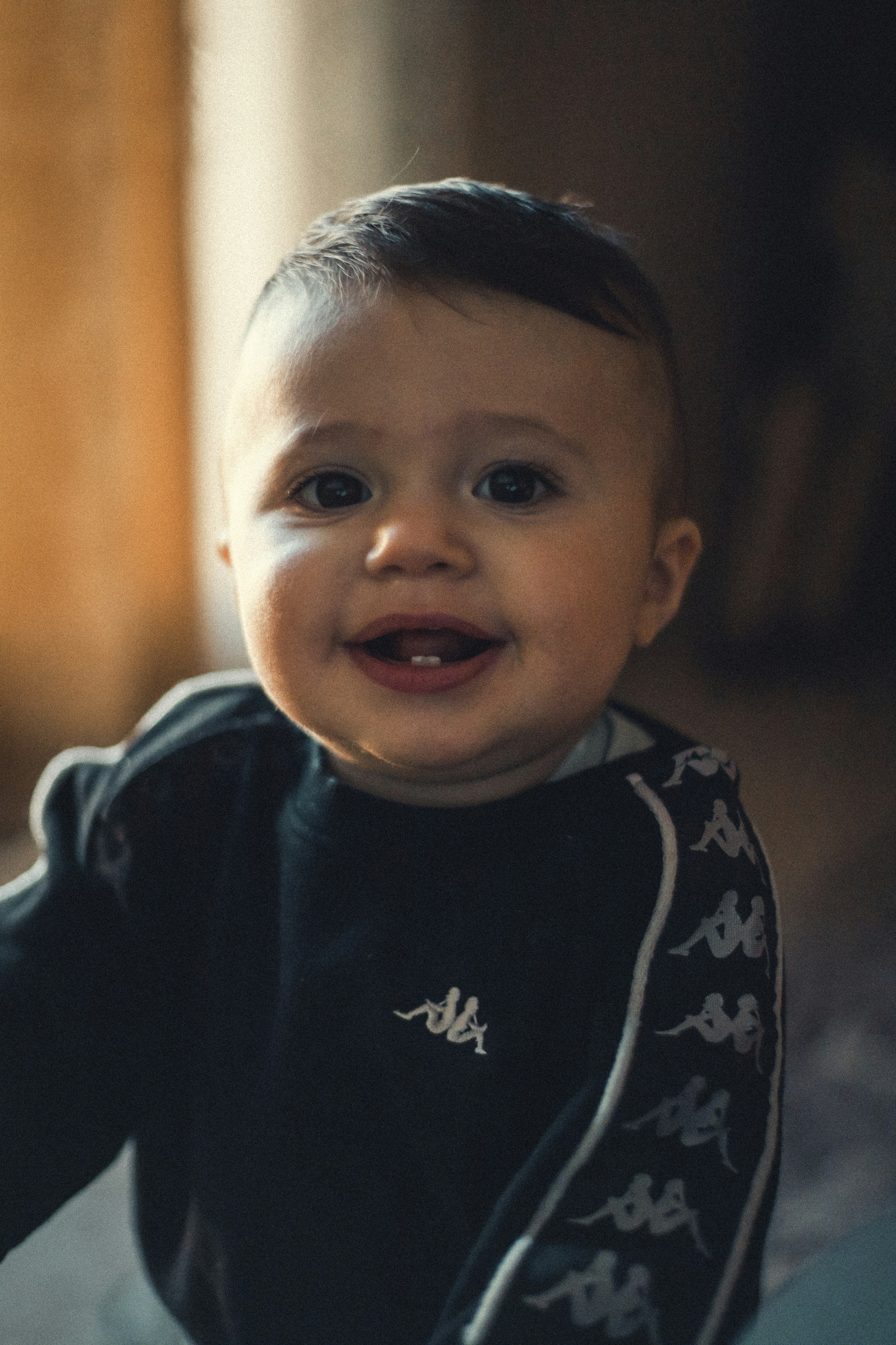Cute Baby Boy With Blue Eyes And Black Hair