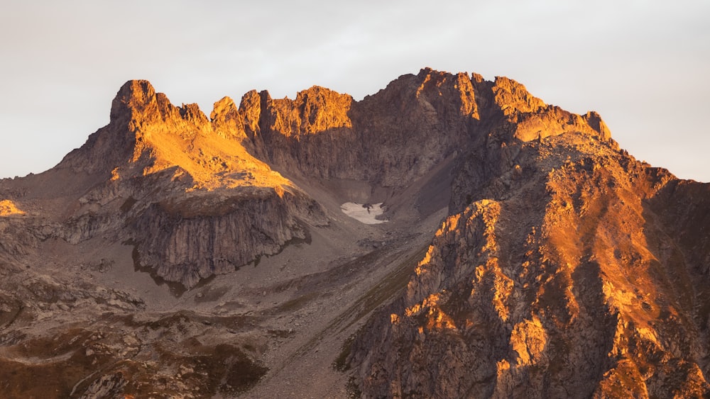 a large mountain with a very tall peak