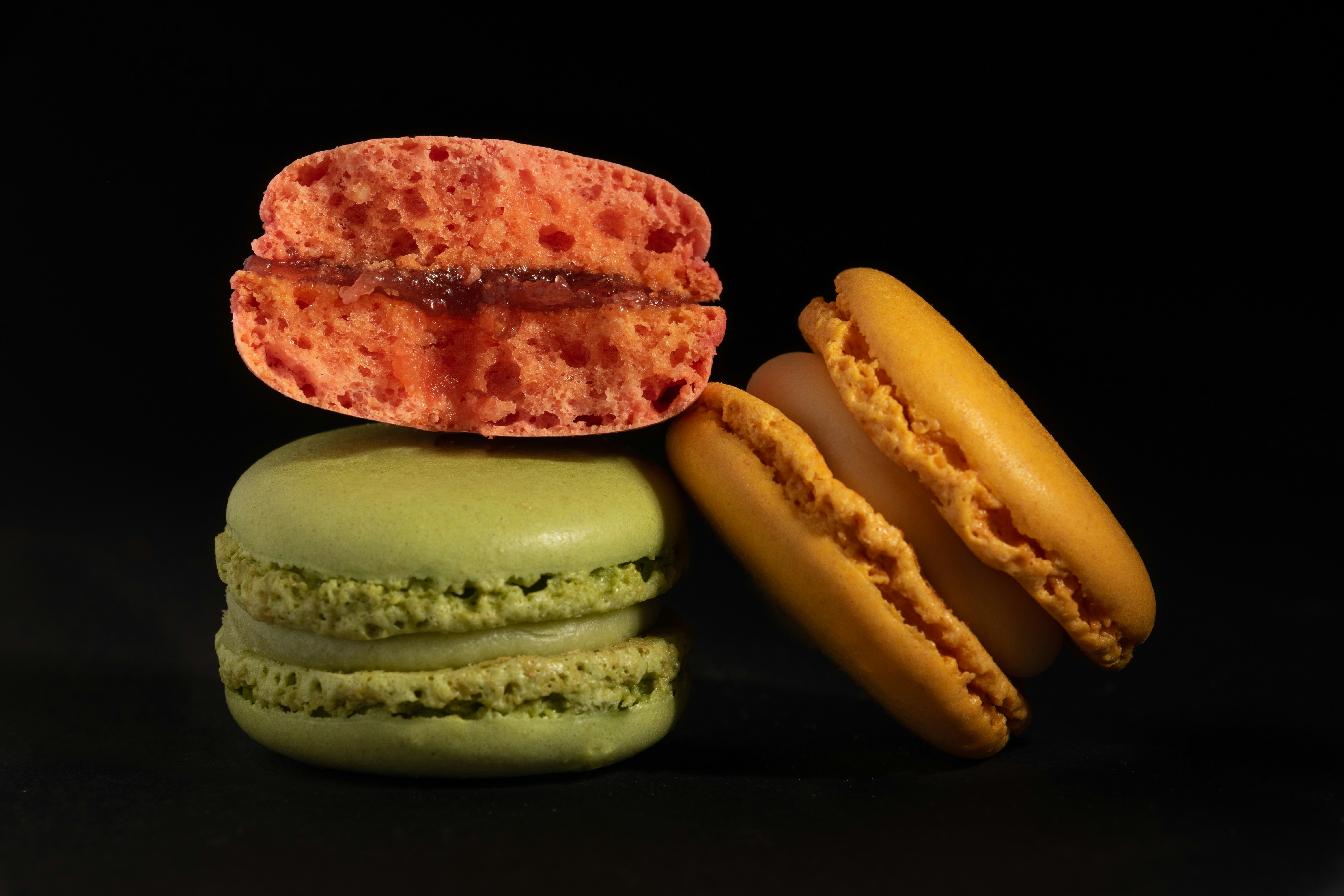 a stack of three different colored macaroons sitting on top of each other