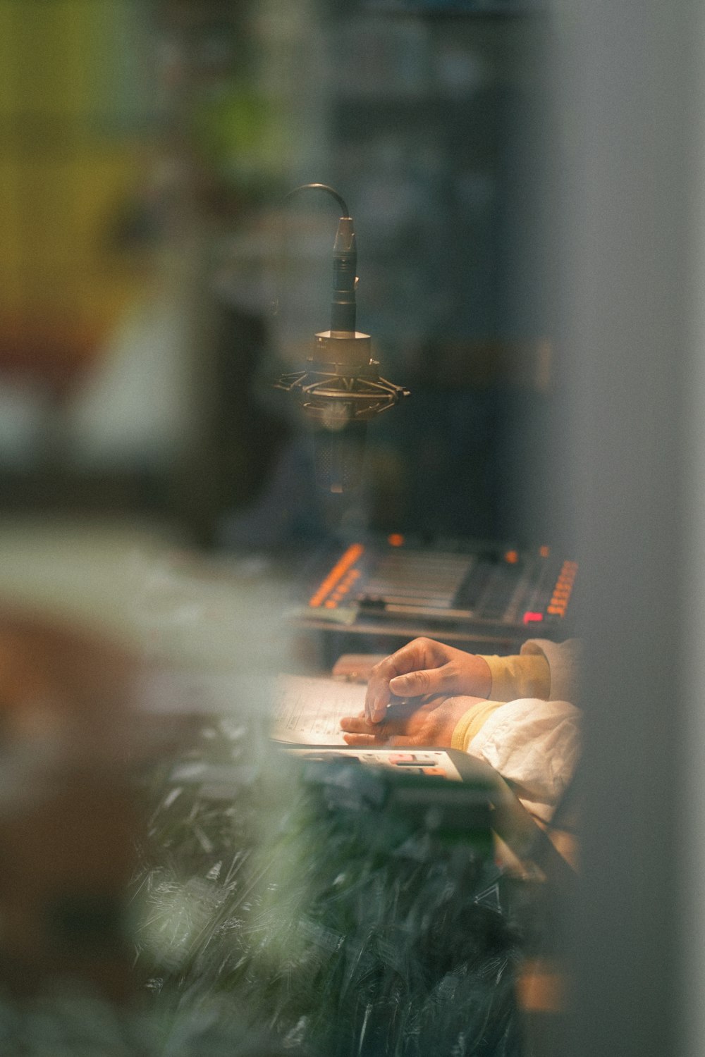 a blurry image of a person working on a laptop