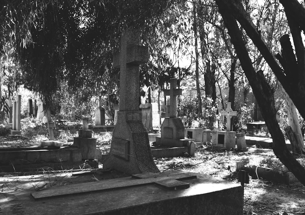 a black and white photo of a cemetery
