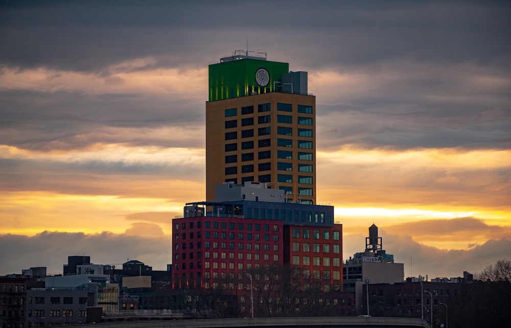 a tall building with a clock on the top of it