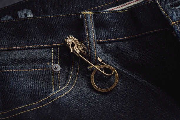 Close-up of a young woman wearing stylish, comfortable premium jeans with detailed stitching and a relaxed fit.