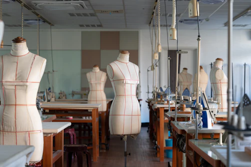 a room filled with mannequins and sewing machines