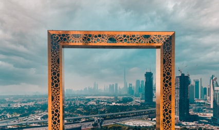 a picture frame in the middle of a city