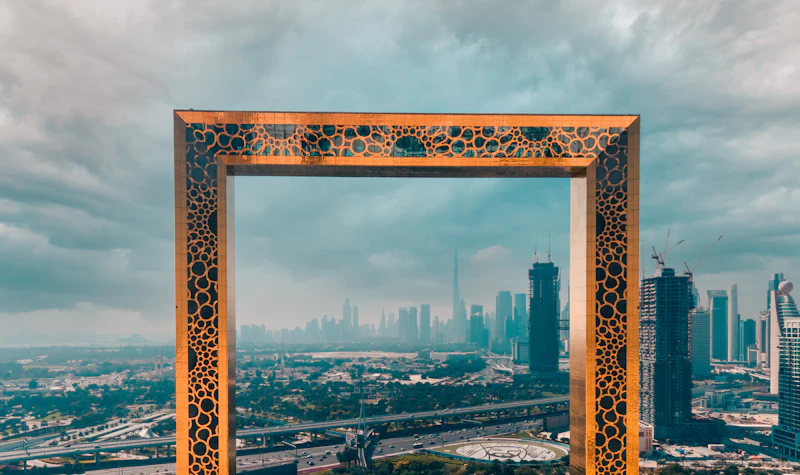 Dubai Frame with the city skyline behind it