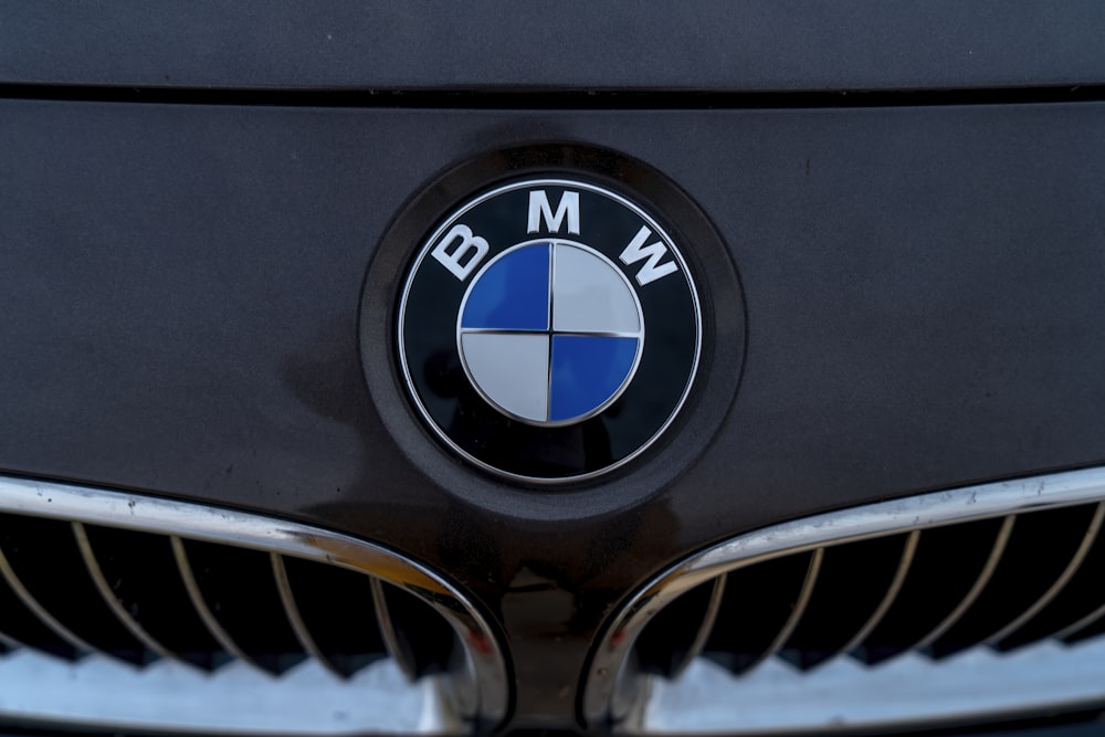 a close up of a bmw emblem on the front of a car