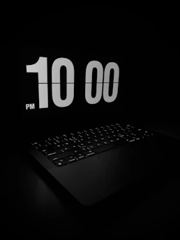 A cozy nighttime scene showing a person typing on a laptop with a soft glowing screen, symbolizing anonymous emotional support.