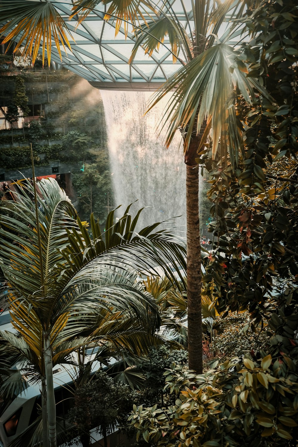 a view of a waterfall from inside a building