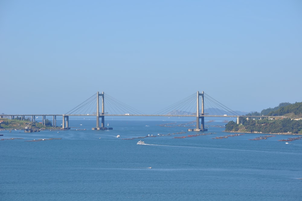 a large bridge spanning over a large body of water