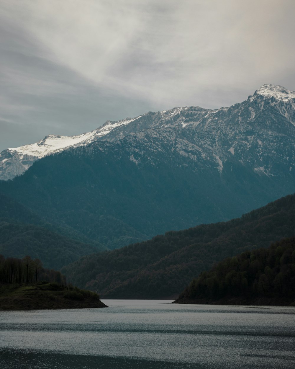 a large body of water surrounded by mountains