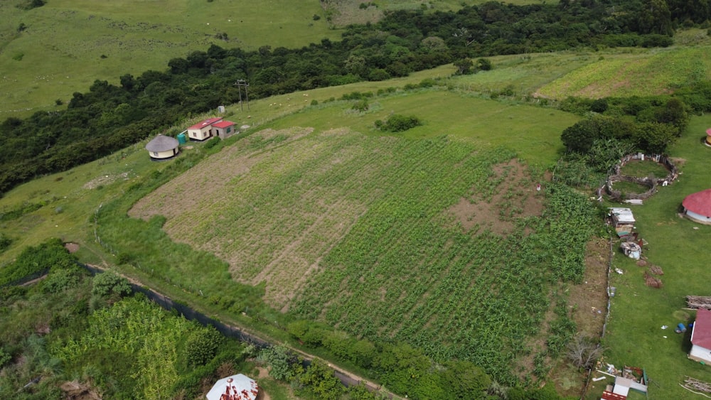 an aerial view of a farm in the country