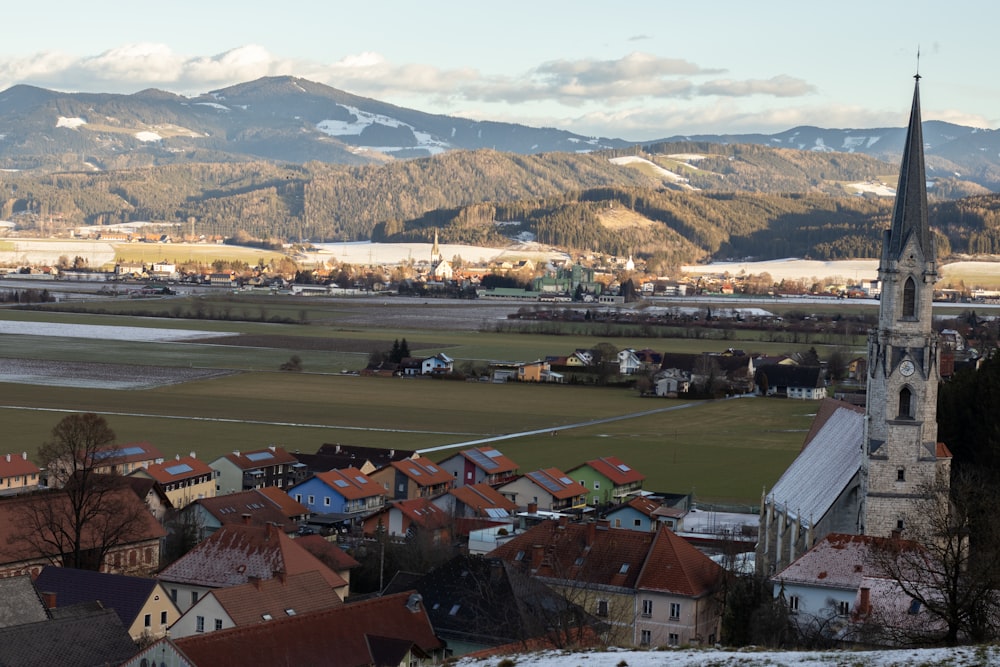 a small town with a church in the middle of it