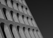 Architectural detail of a modern building symbolizing strength and legacy.