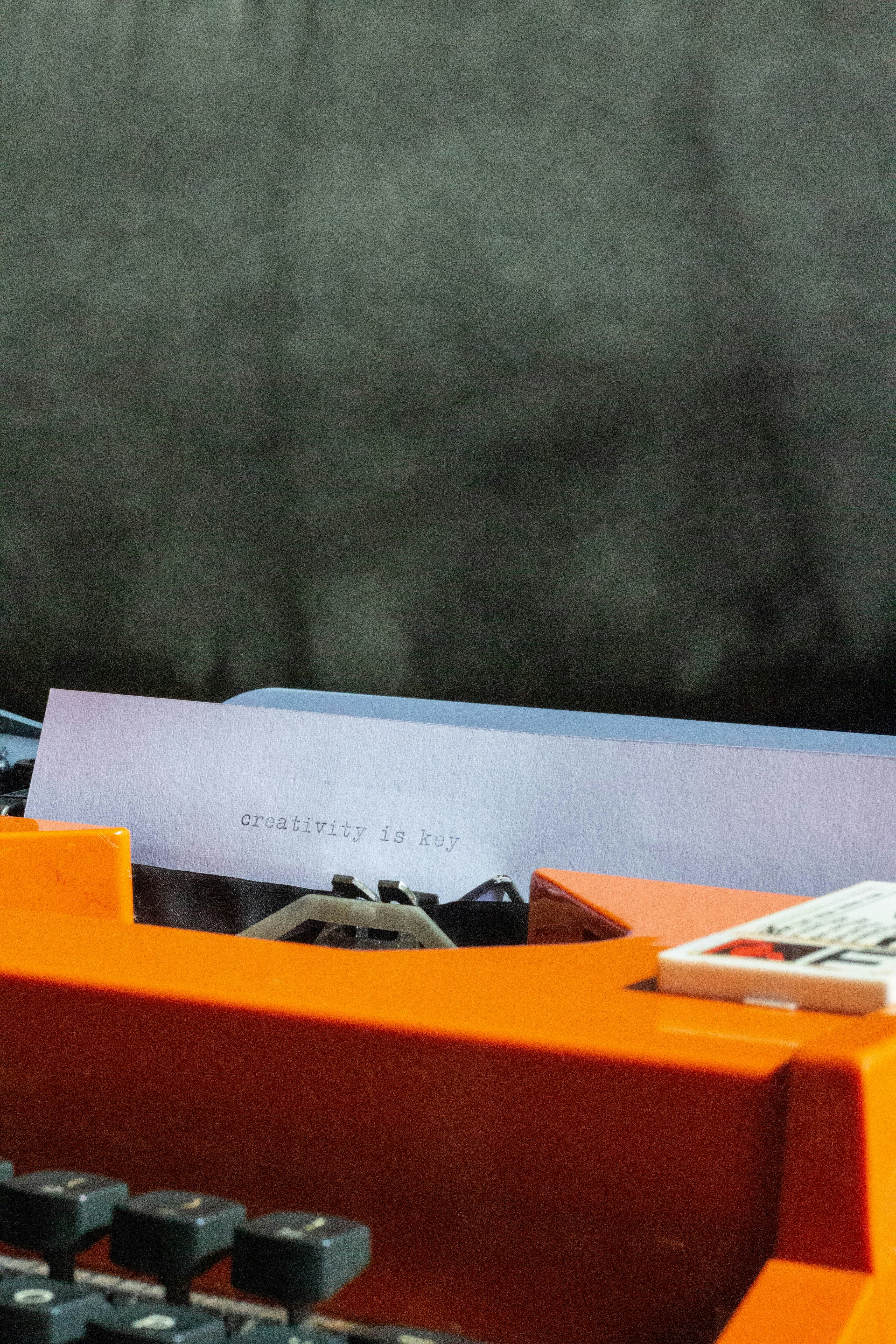 A close up of a keyboard and a paper photo – Free Writing Image on Unsplash