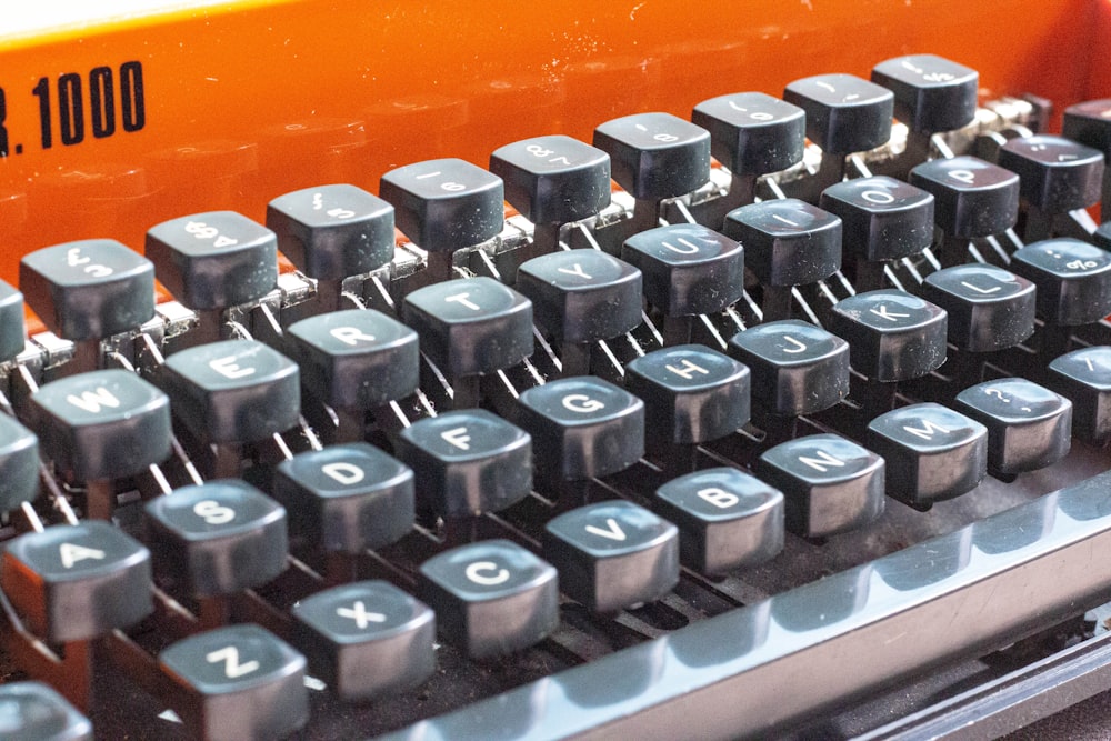 a close up of an old fashioned typewriter