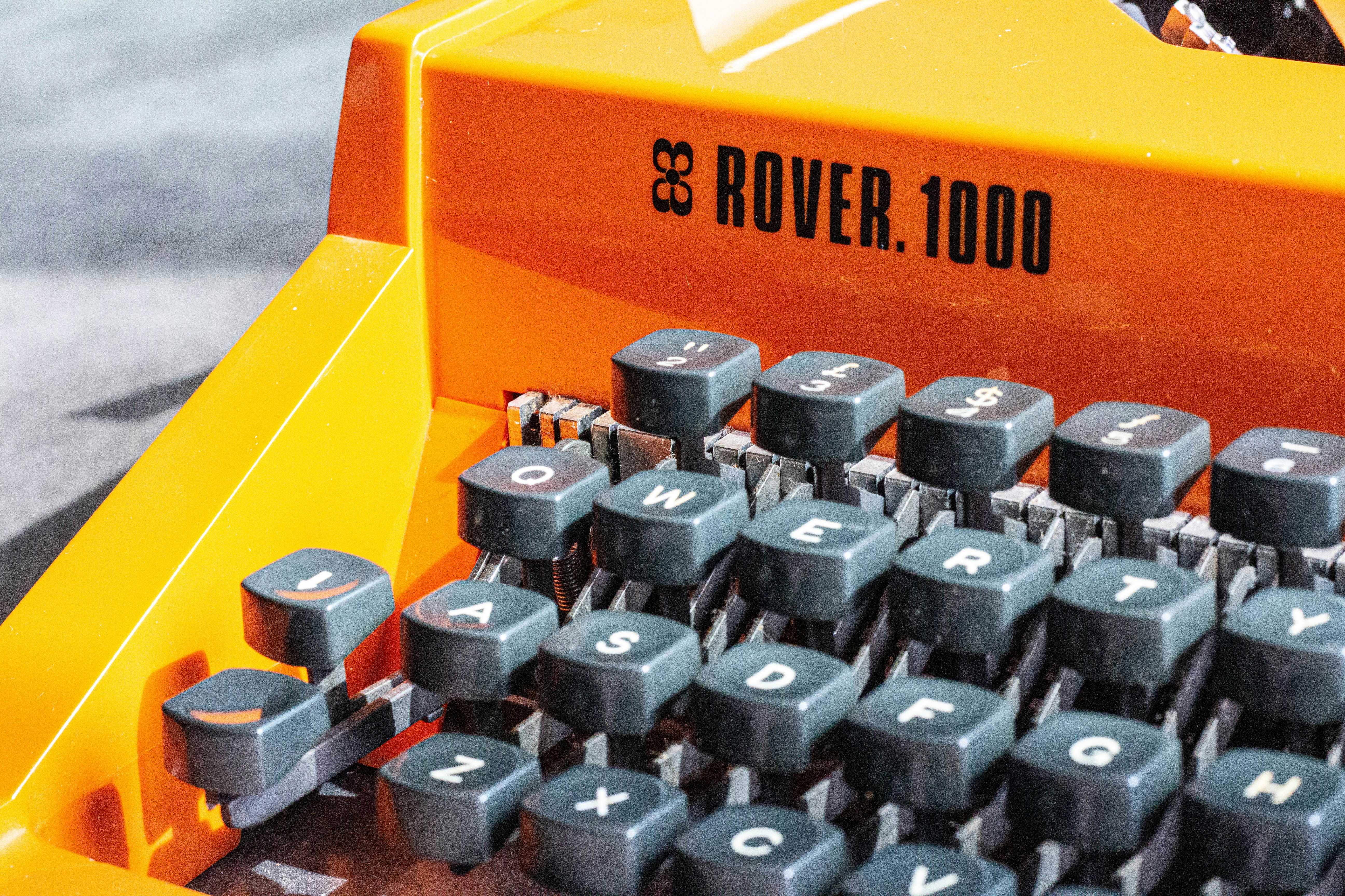 a close up of an old fashioned typewriter