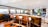 Luxurious yacht interior with elegant wooden finishes and modern nautical design elements.