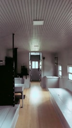 Interior of a tiny house showcasing compact furniture.
