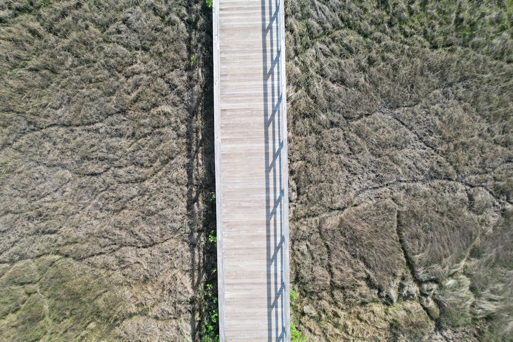 an aerial view of a bridge over a river