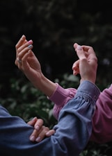 a couple of people that are holding hands