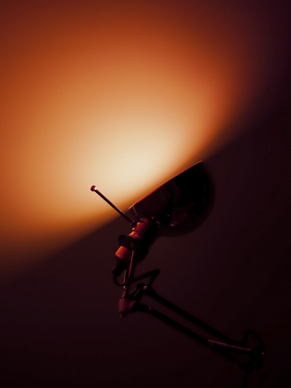 a close up of a street light on a dark background