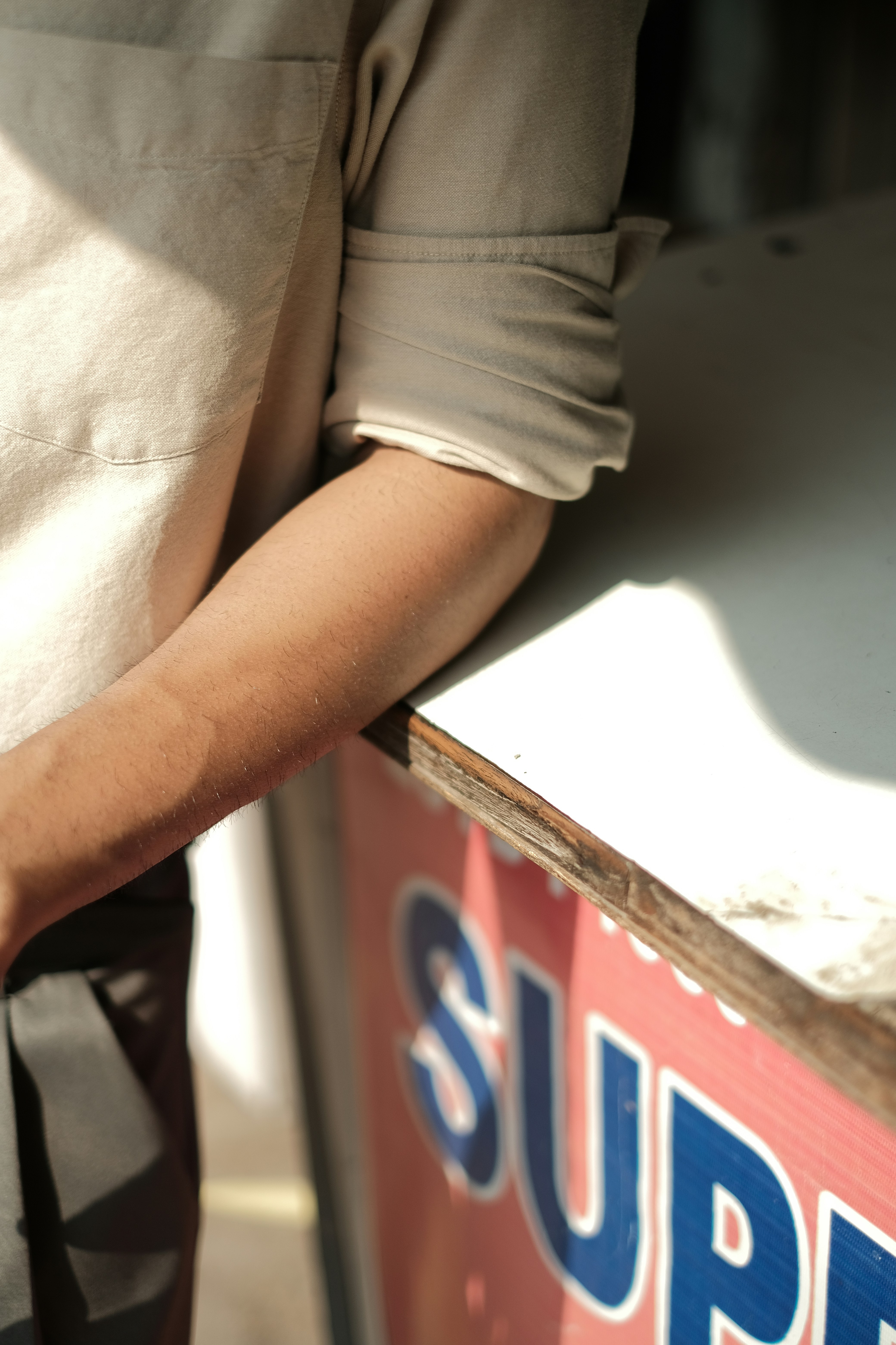 a close up of a person opening a box