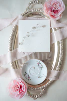 Elegant resin tray with floral inclusions resting on a cozy linen cloth