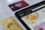a smart phone sitting next to a credit card