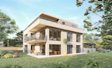 A modern, three-story house with large windows and balconies is surrounded by a lush, green garden. The building features contemporary architecture with clean lines and a flat roof. The garden is well-maintained with various trees, flowers, and a small patio area with outdoor furniture.