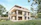 Finished modern house with clean lines and landscaped garden.