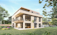 A modern, three-story house with large windows and balconies is surrounded by a lush, green garden. The building features contemporary architecture with clean lines and a flat roof. The garden is well-maintained with various trees, flowers, and a small patio area with outdoor furniture.