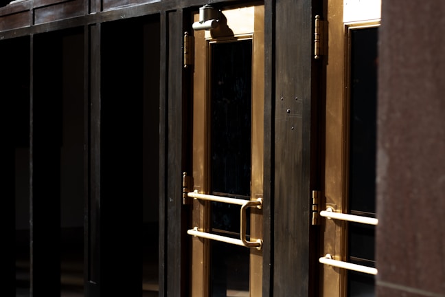 A variety of residential security doors displayed in a showroom.
