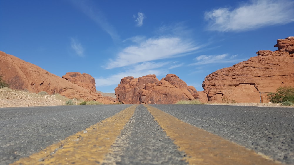 a road with a yellow line in the middle of it