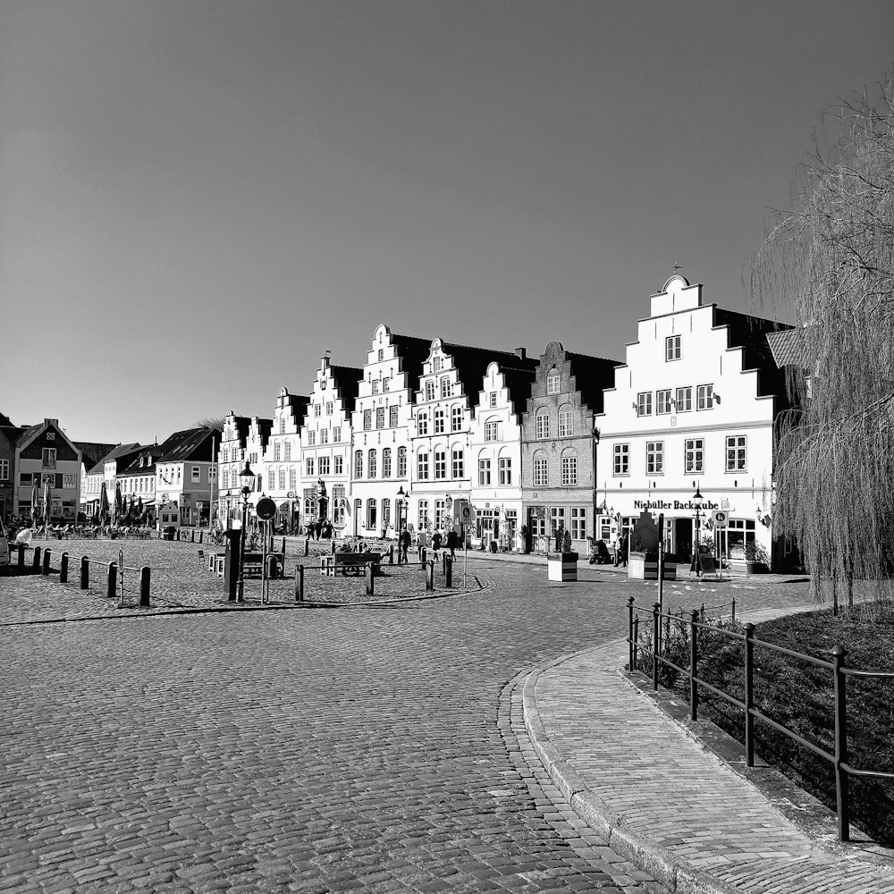 a black and white photo of a town square