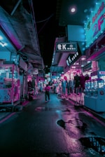 A vibrant street scene at night with neon lights and a group of friends wearing bold streetwear.