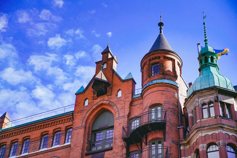 a large brick building with a clock tower